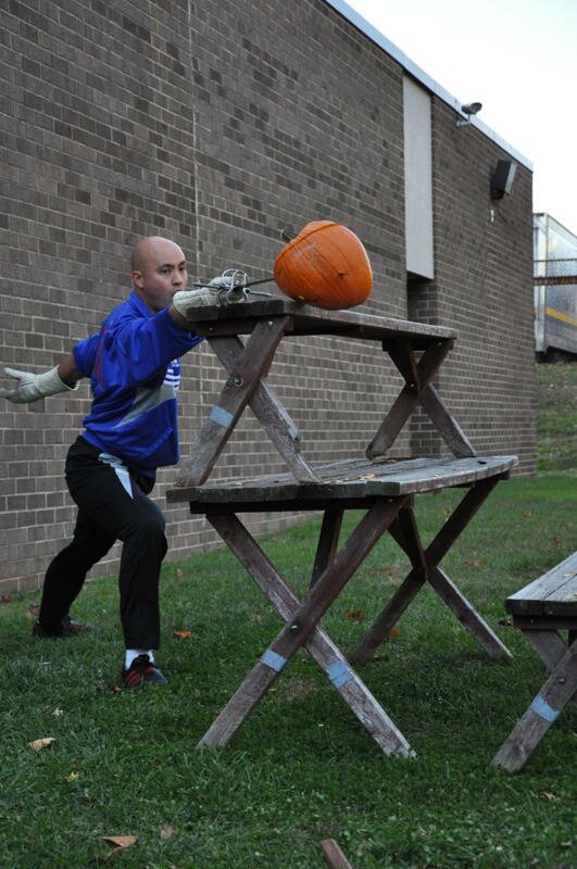 Coach Bill gives a fun Halloween-time sword demonstration.