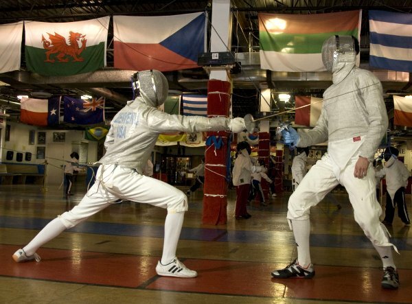 Leaping fencer