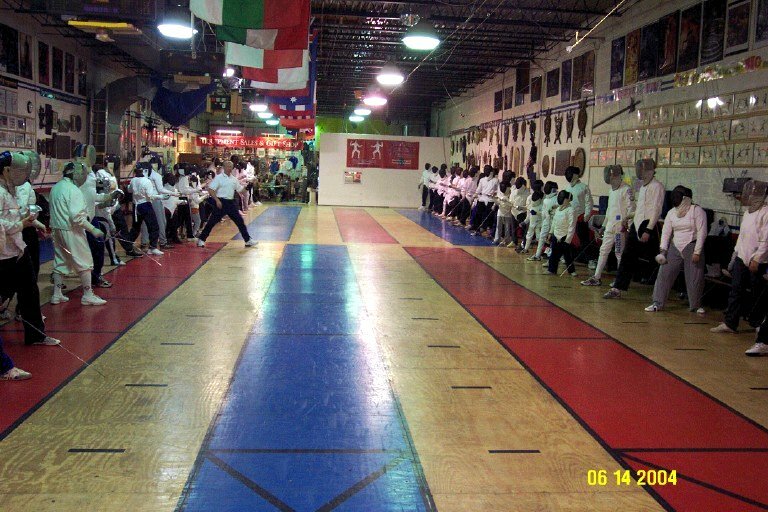 Fencers with coach
